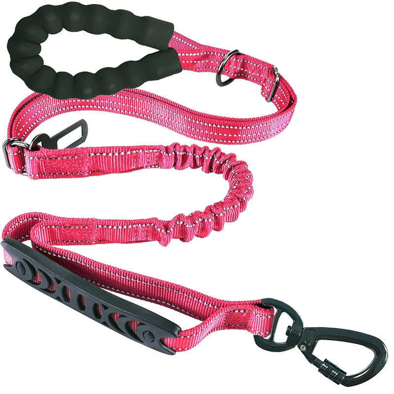 Pink dog leash with black ergonomic handle and carabiner clip, designed for all-weather trail walks