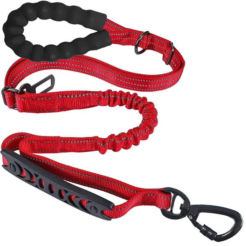 Red reflective dog leash with ergonomic handle and carabiner clip for trail walking